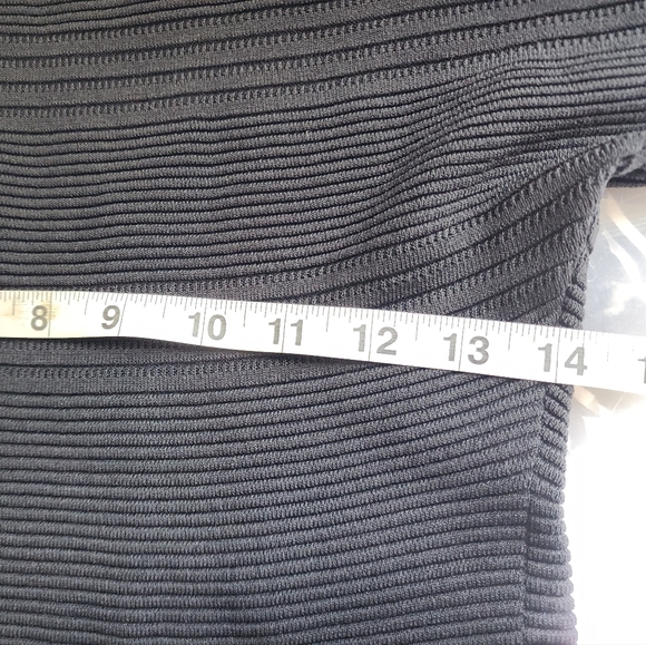 Adolfo Dominguez is a black sophisticated dress. - Picture 4 of 8